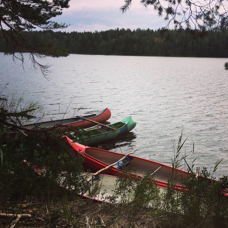 Canoes on the river bank